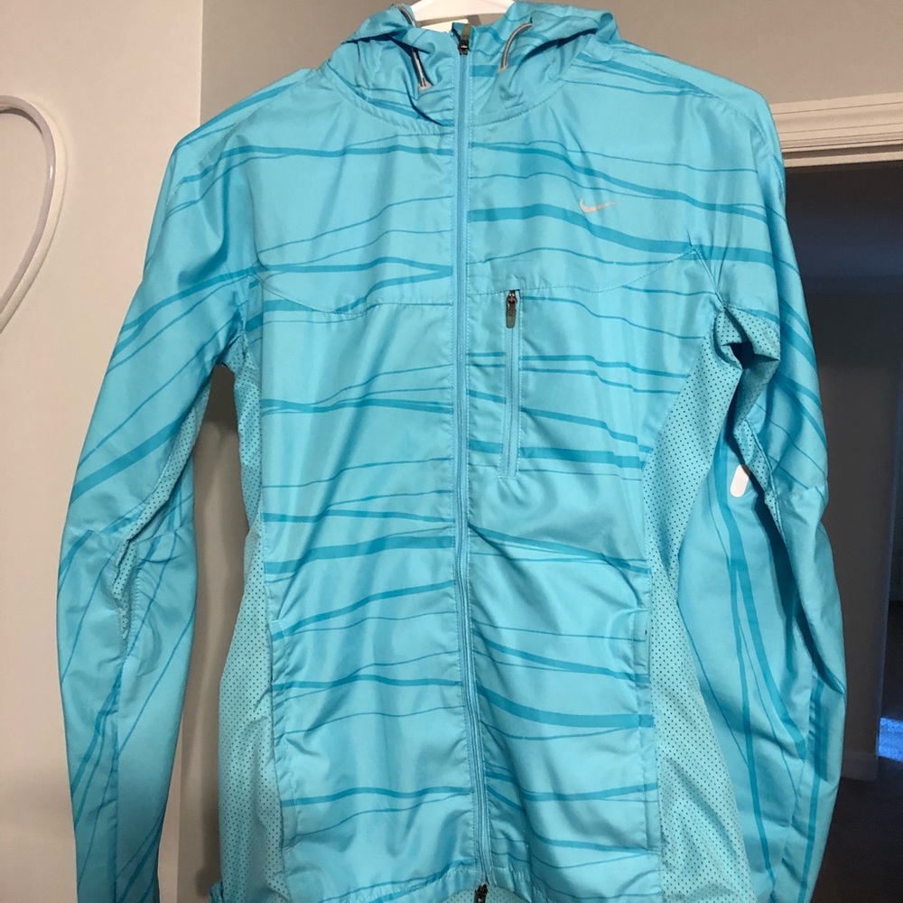 Blue Nike running wind breaker